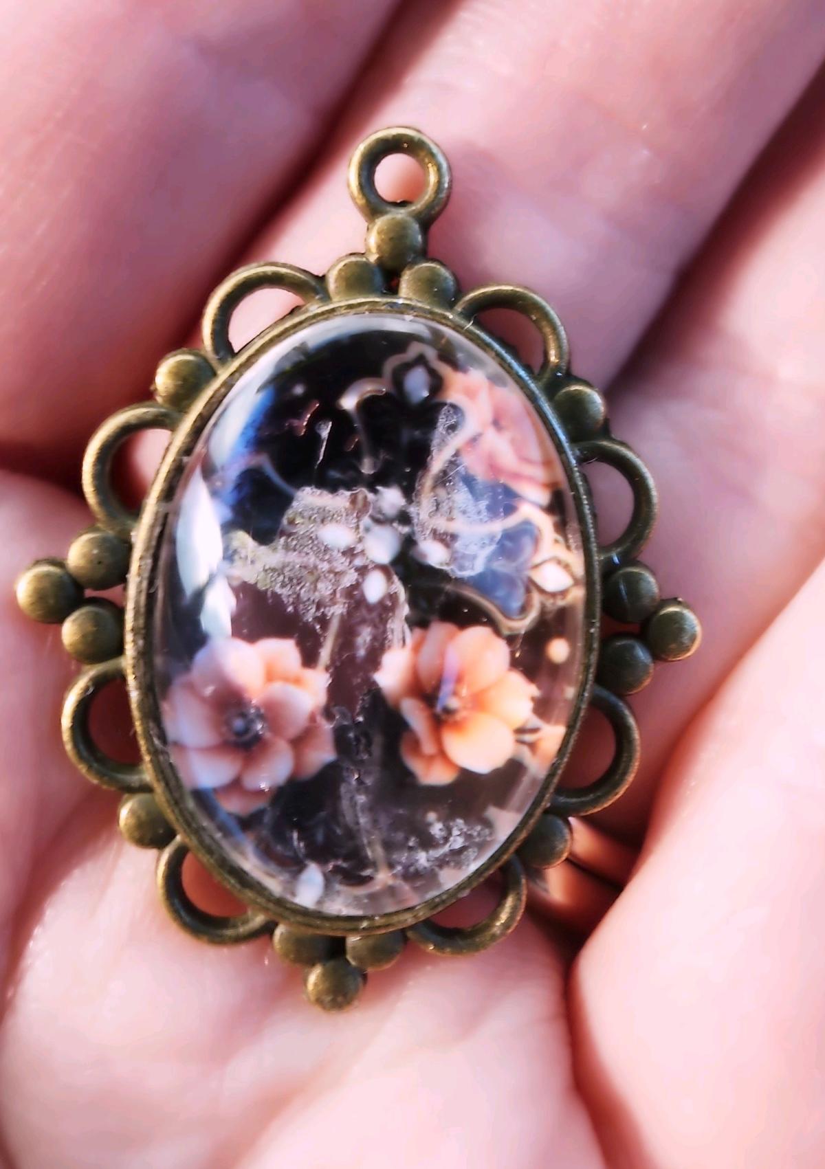 haunted cross picture in a pendant - Romney, West Virginia - FleaMarketBay