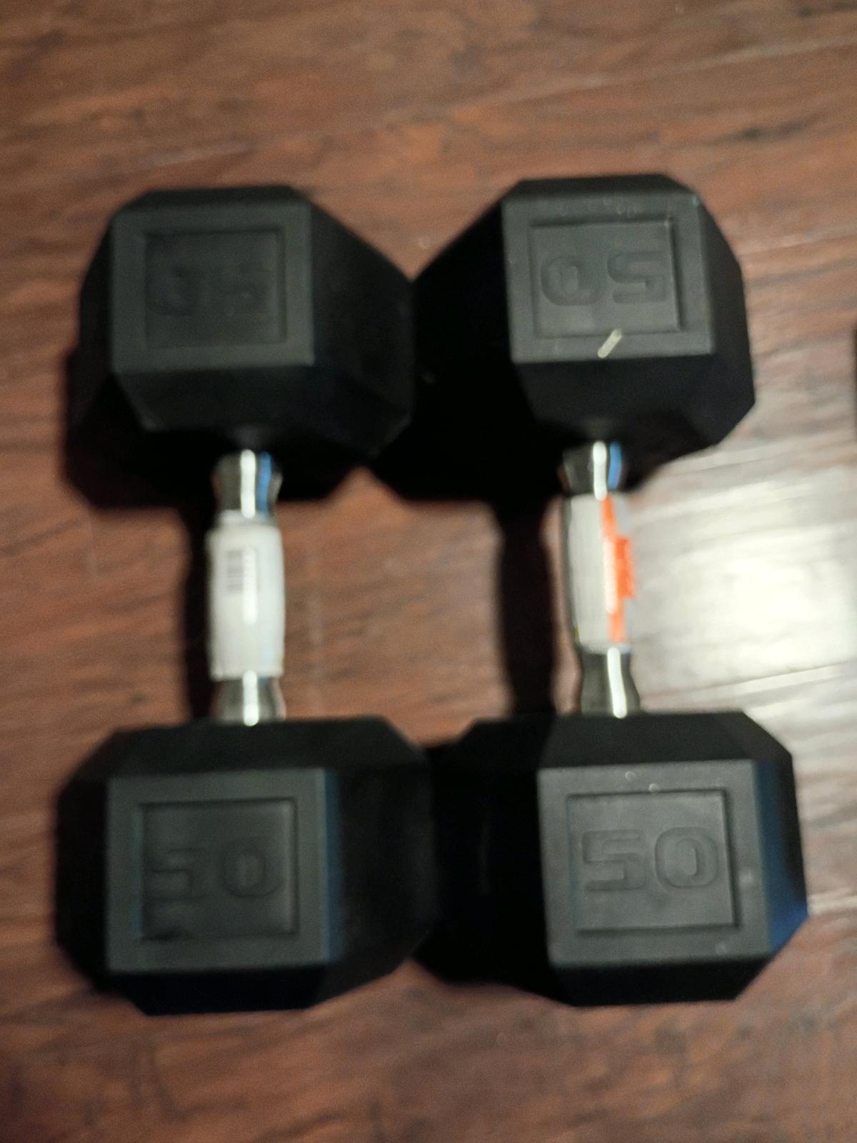 set of 50lbs dumbbells