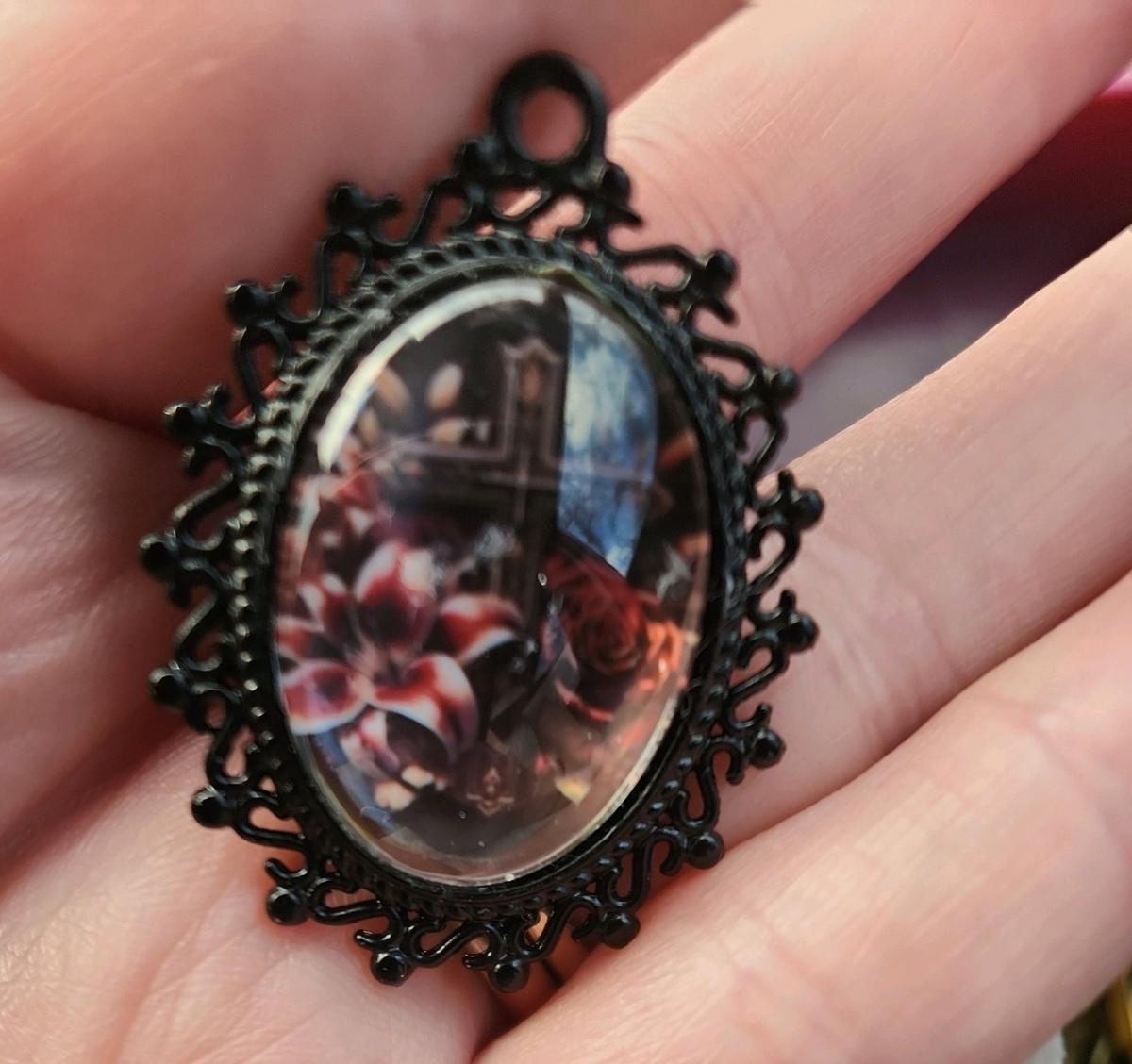 Cross n flowers in black pendant - Romney, West Virginia - FleaMarketBay