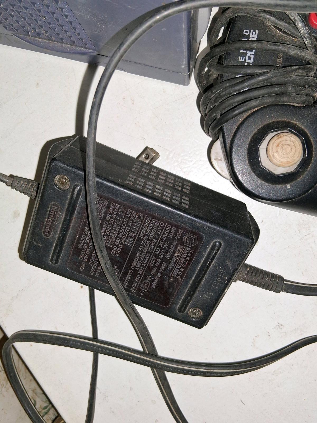 gamecube and 4 controllers