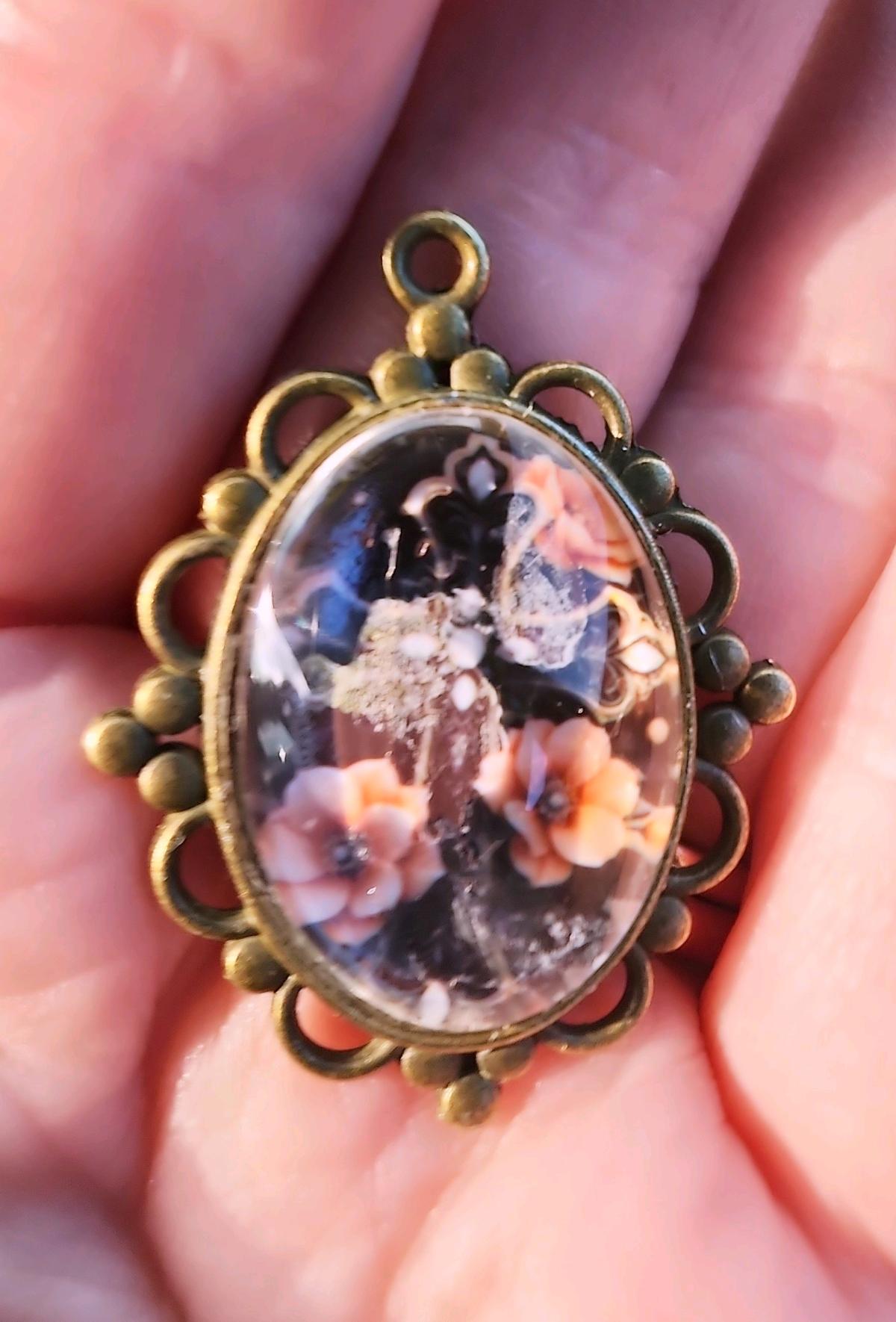 haunted cross picture in a pendant - Romney, West Virginia - FleaMarketBay