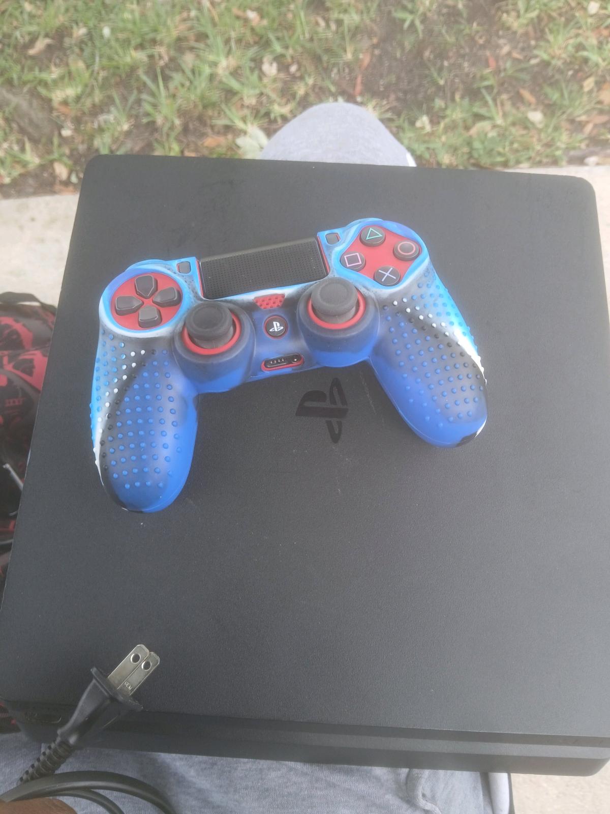 Playstation 4 comes with cord red controller and a full grip - Homestead, Florida - FleaMarketBay