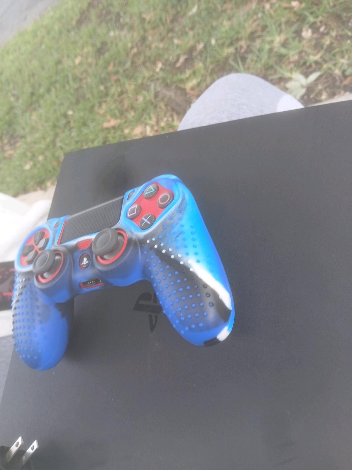 Playstation 4 comes with cord red controller and a full grip - Homestead, Florida - FleaMarketBay