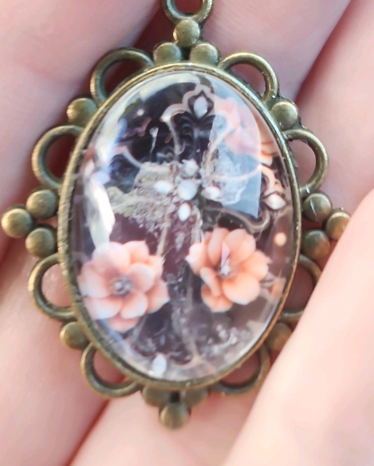 haunted cross picture in a pendant - Romney, West Virginia - FleaMarketBay