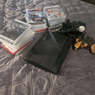 PS3 w 27 games 2 controllers  other accessories - Thumbnail 5